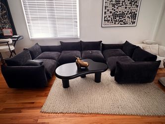 The color is black, it is very wide and comfortable