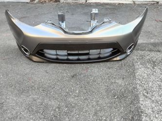2017-2019 Nissan Rogue Sport front bumper with fog lights accessories OEM.