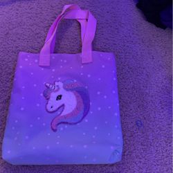 A unicorn bag, rainbow, kind of color