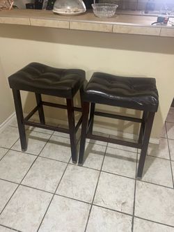 Brown leather bar stools