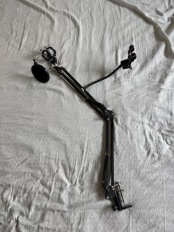Desk-mounted microphone boom arm