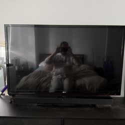 LG 50” Tv - NOT SMART + Sound Bar