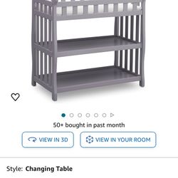 Delta Changing Table With Pad And 2 Diaper Depots 