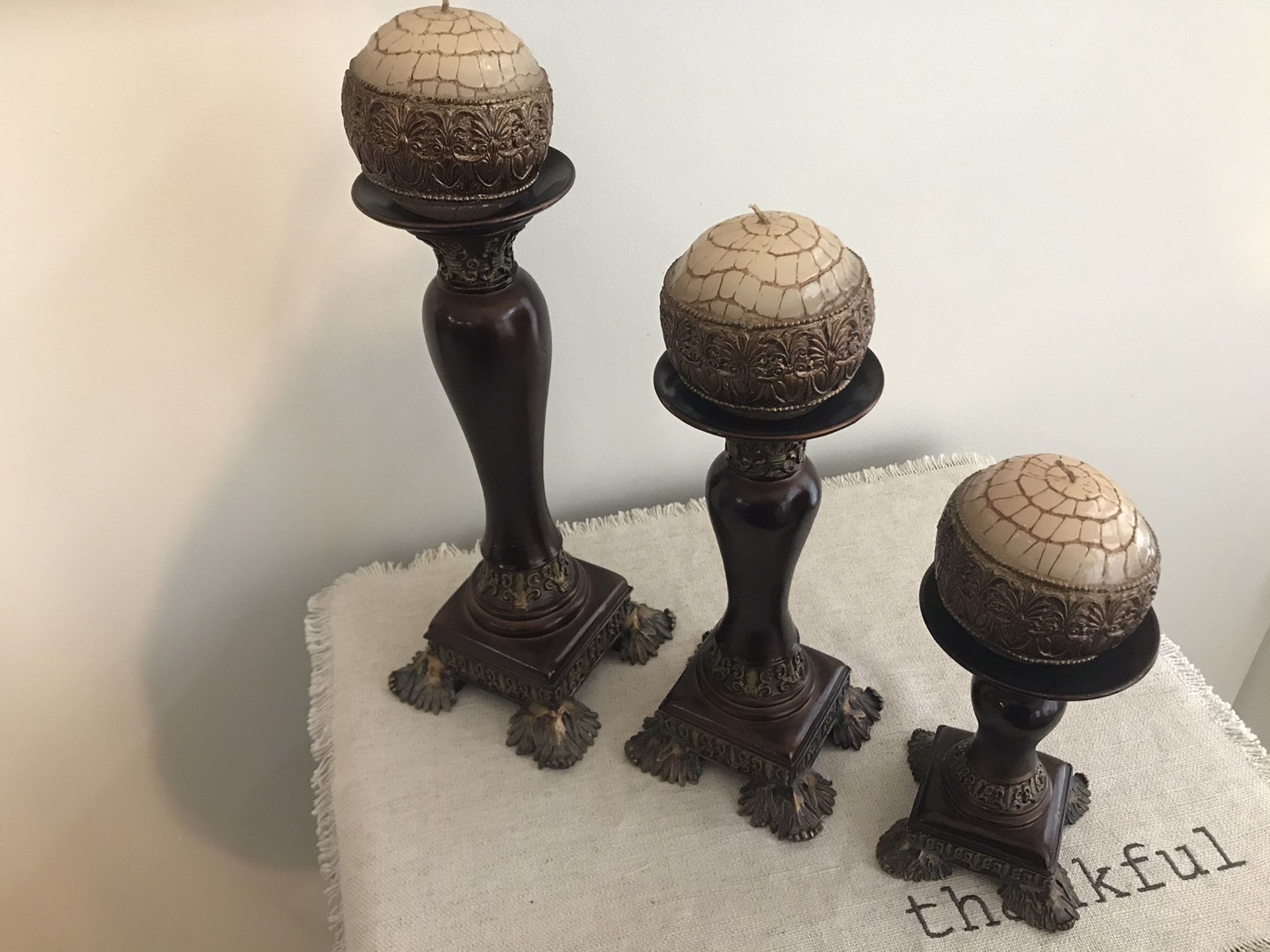 3 wood candle holders/pillars with candles