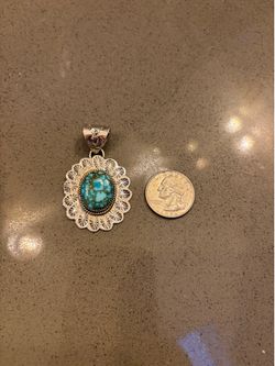 turquoise and silver pendant