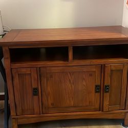 Ashley Signature Counsel for TV . Lots of storage ( Cloths, Books, Games) 