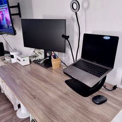 Desk with sit and stand functionality