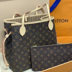 The "Eternity" series MM model with lettered logo canvas handbag, equipped with an inner pocket