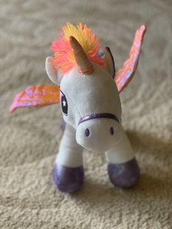 Rainbow unicorn stuffed animal