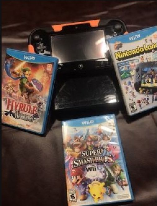 NINTENDO WII U + GAMES AND CABLES