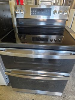 Gec electric range stainless steel convection Oven steam clean wi-fi  air fryer Doble Oven new condition warranty Financing With Snap If You Qualify m