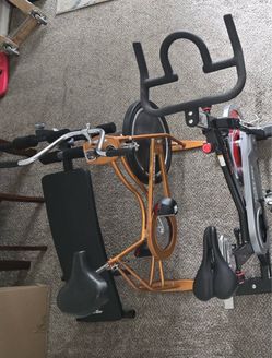 Two Exercise Bikes + Finer Form Adjustable Weight Bench/Roman Chair - Full Home Gym Setup