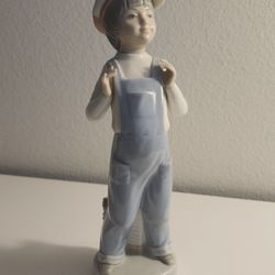Retired Lladró #4898 Glazed Porcelain Figurine. Boy from Madrid. Overalls with Accordion. Designed in Spain by LLadro sculptor Francisco Catalán 