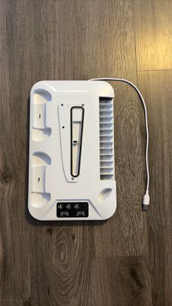 all-in-one vertical cooling stand and charging dock for a PlayStation 5 (PS5) console.