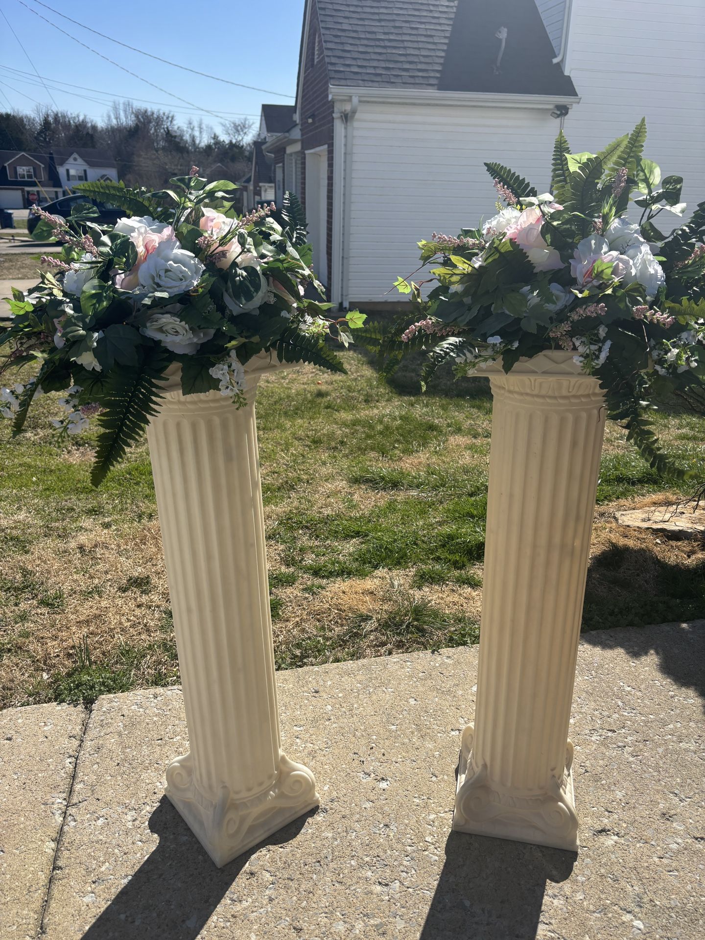 Roman Bases With Floral Arrangements
