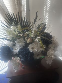 A Glass Vase With All Sorted Flowers