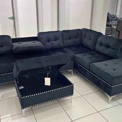 Black Velvet Reversible Sectional With Cup Holder And Storage Ottoman. Brand New.