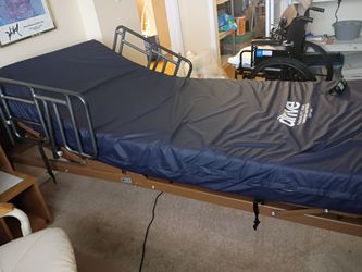 BARELY USED FULLY AUTOMATIC HOSPITAL BED