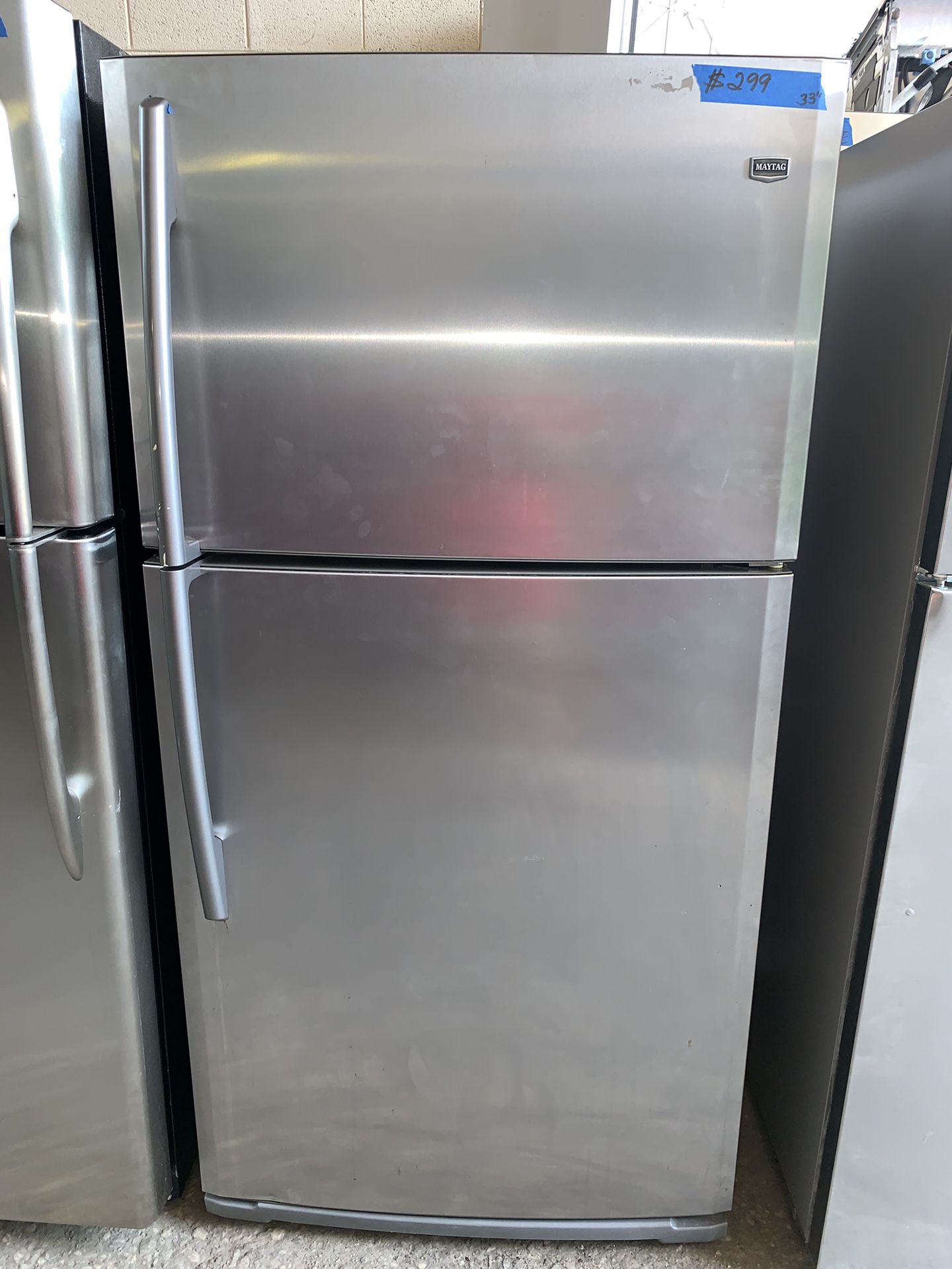 Maytag 33in. Stainless steel top and bottom refrigerator working perfectly with 4 months warranty
