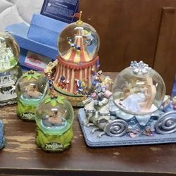 Retired Disney Snow Globes