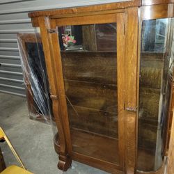 Antique Curio With Wheels And Glass