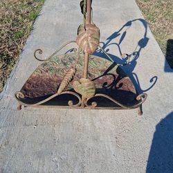 Antique metal garden stand