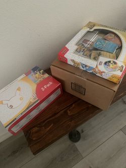 Sealed Pokemon lot 30th celebrations and ascended mini tins