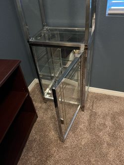 2 glass/metal display cases