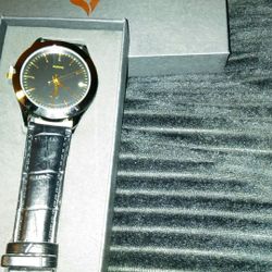 New in box quartz watch. Local delivery.