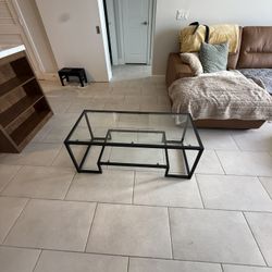 Black metal and glass coffee table
