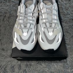 Size 10, men’s brand new unworn Adidas shoes with tags and box 