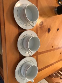 Set of three coffee/tea mugs with saucers