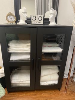 Brimnes cabinet with 2024 doors glass black