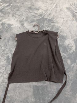 Casual knit top with a tie-waist design, size S.