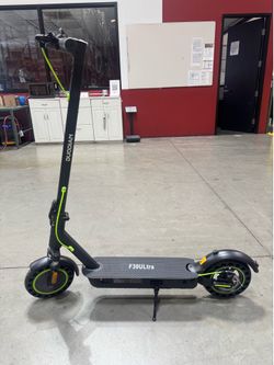 Double shock-absorbing electric scooter