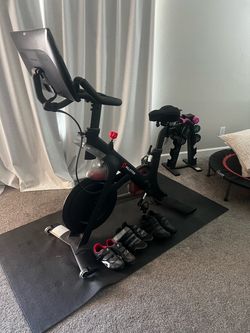 Peloton bike/ shoes/ indoor mat.