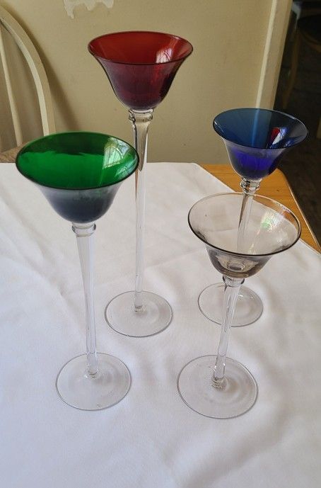 4 Graduated Clear Long Stemmed Tea Light Candle.