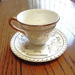 porcelain 50th anniversary teacup and saucer set 3” dia cup x 5” dia  Saucer 