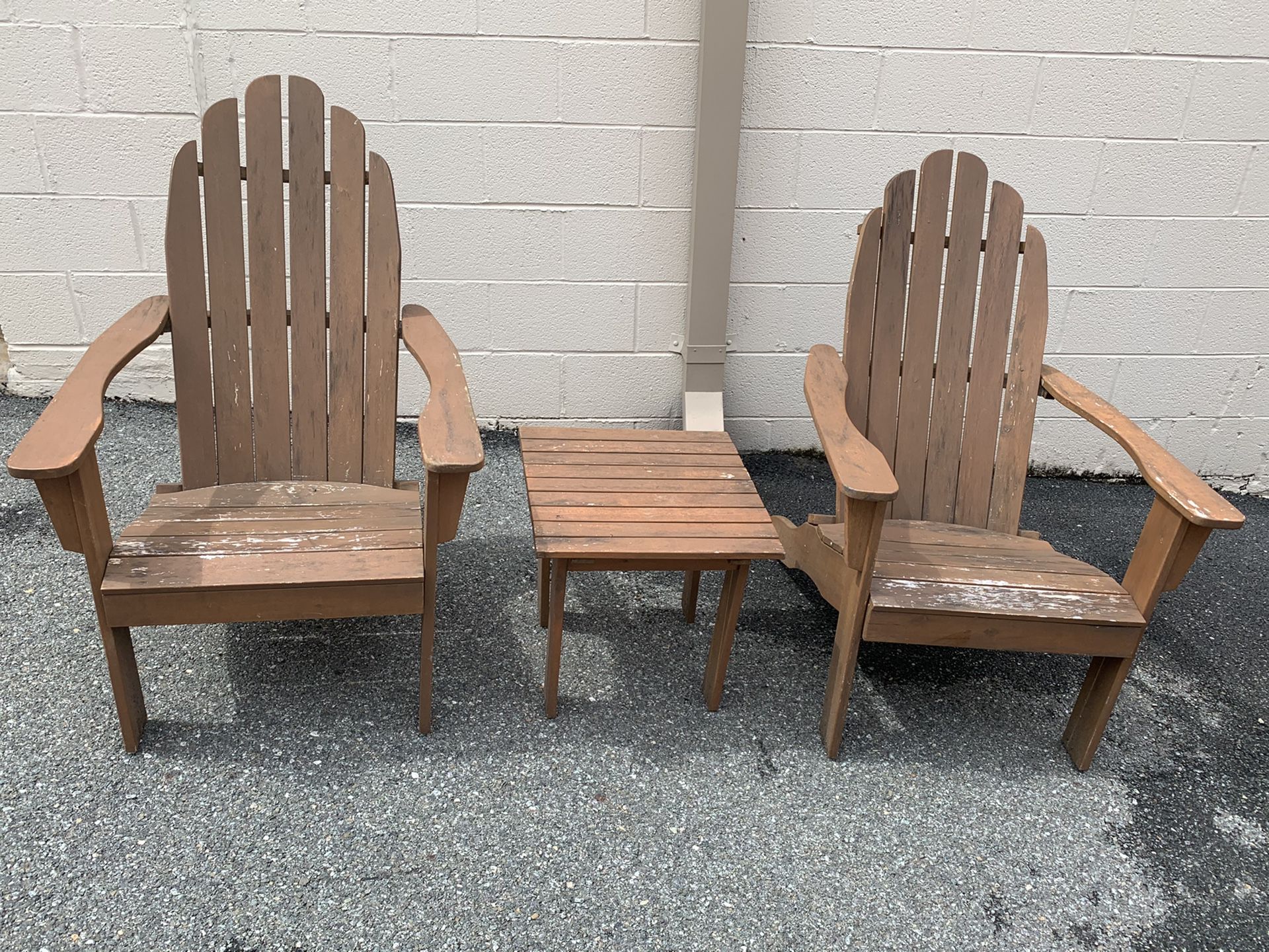 Sturdy wooden Adirondack chairs and table