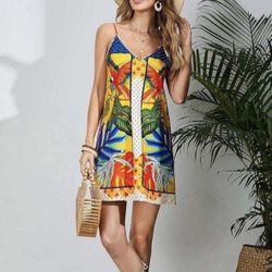 The strap dress with tropical and parrot print