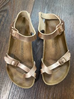 Women’s rose gold Birkenstock sandals size 7.5
