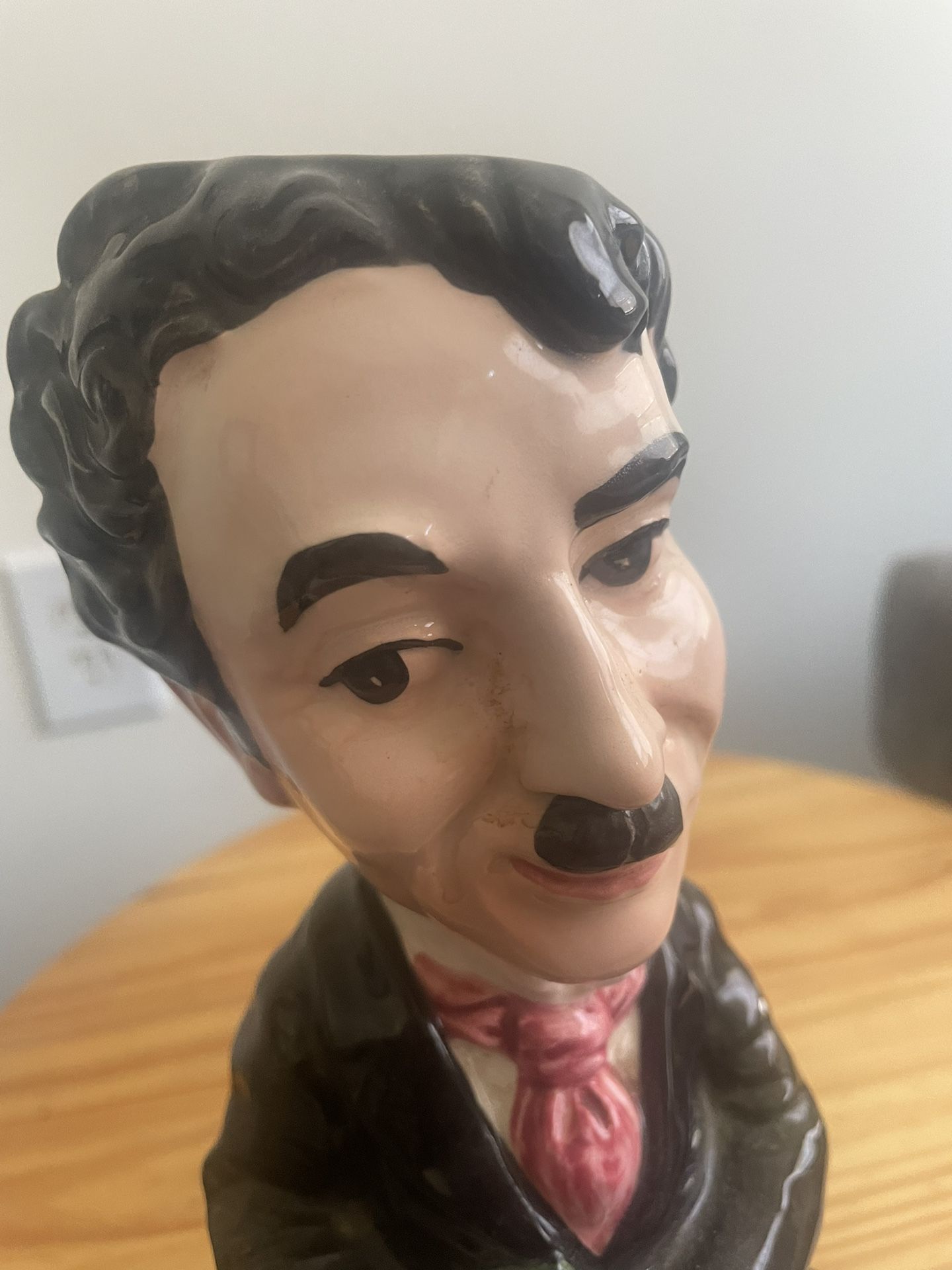 Antique Figure that plays music When you spin It.