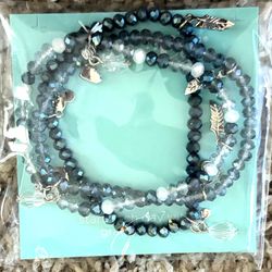 Stretch Bracelets With Beads And Charms, New In Package