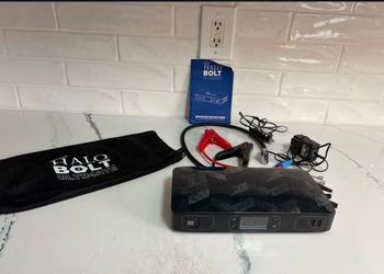 Halo Bolt Ultimate portable jump starter and air compressor with ac/ dc plug