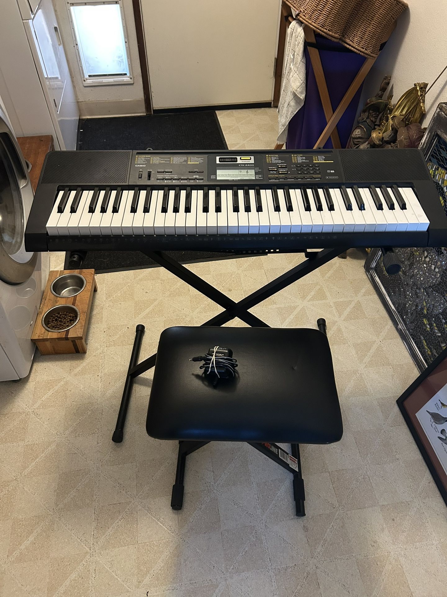 Casio CTK-2400 sampling keyboard in great condition. Has many voices in the ability to sample. Very versatile and a wonderful keyboard for someone le