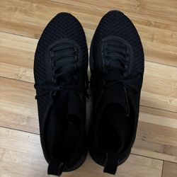 Men’s black Reebok Slip On Size 10