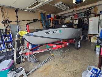 12 ft Porta Bote/6 HP suzuki/trailer