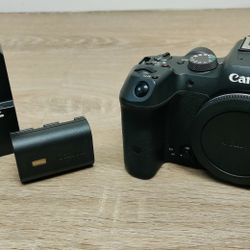 Canon EOS R7 mirrorless camera body with battery