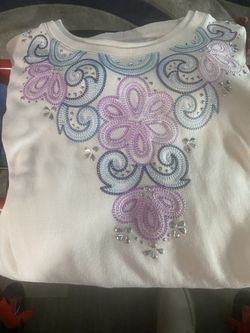 Woman’s Long Sleeve Top