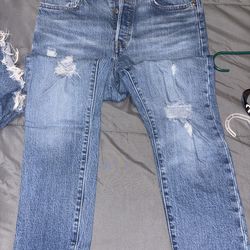 Levi ripped jeans and shorts size 28-29 with purple top size medium